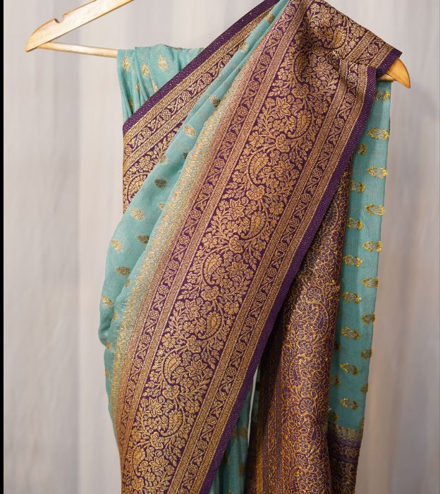 Elegant Semi Pure Khaddi Georgette Saree With Contrast Teal Border
